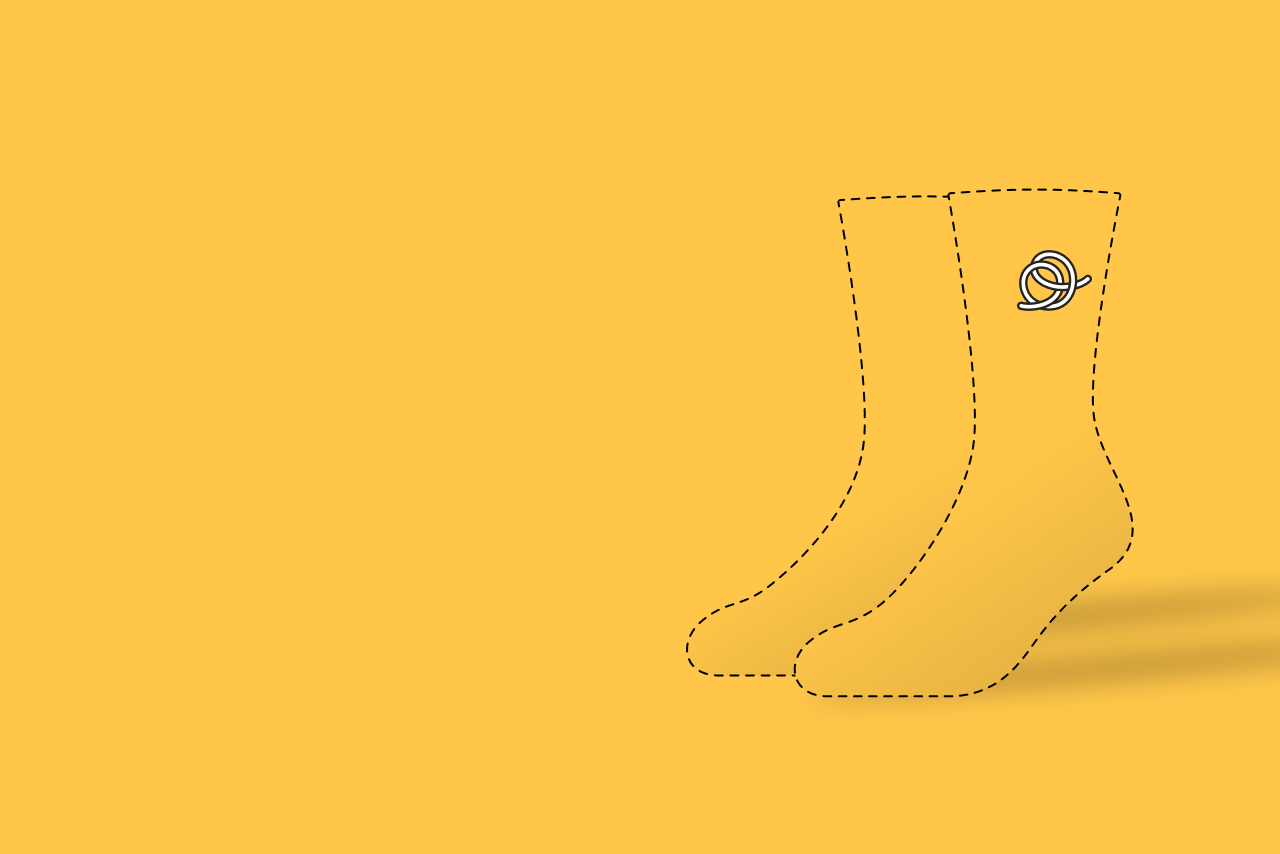 Outline of socks with a logo on a yellow background